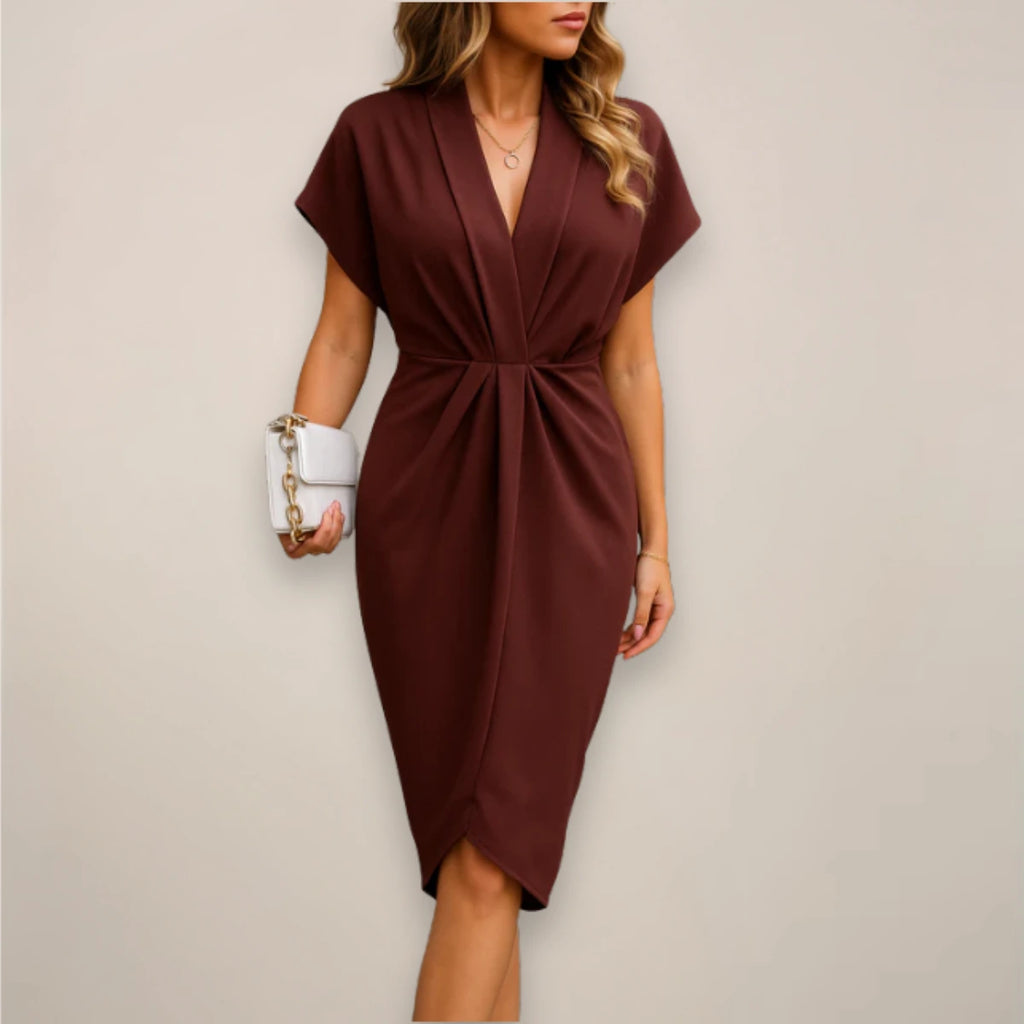 Woman wearing a red wine wrap midi dress - studio photo