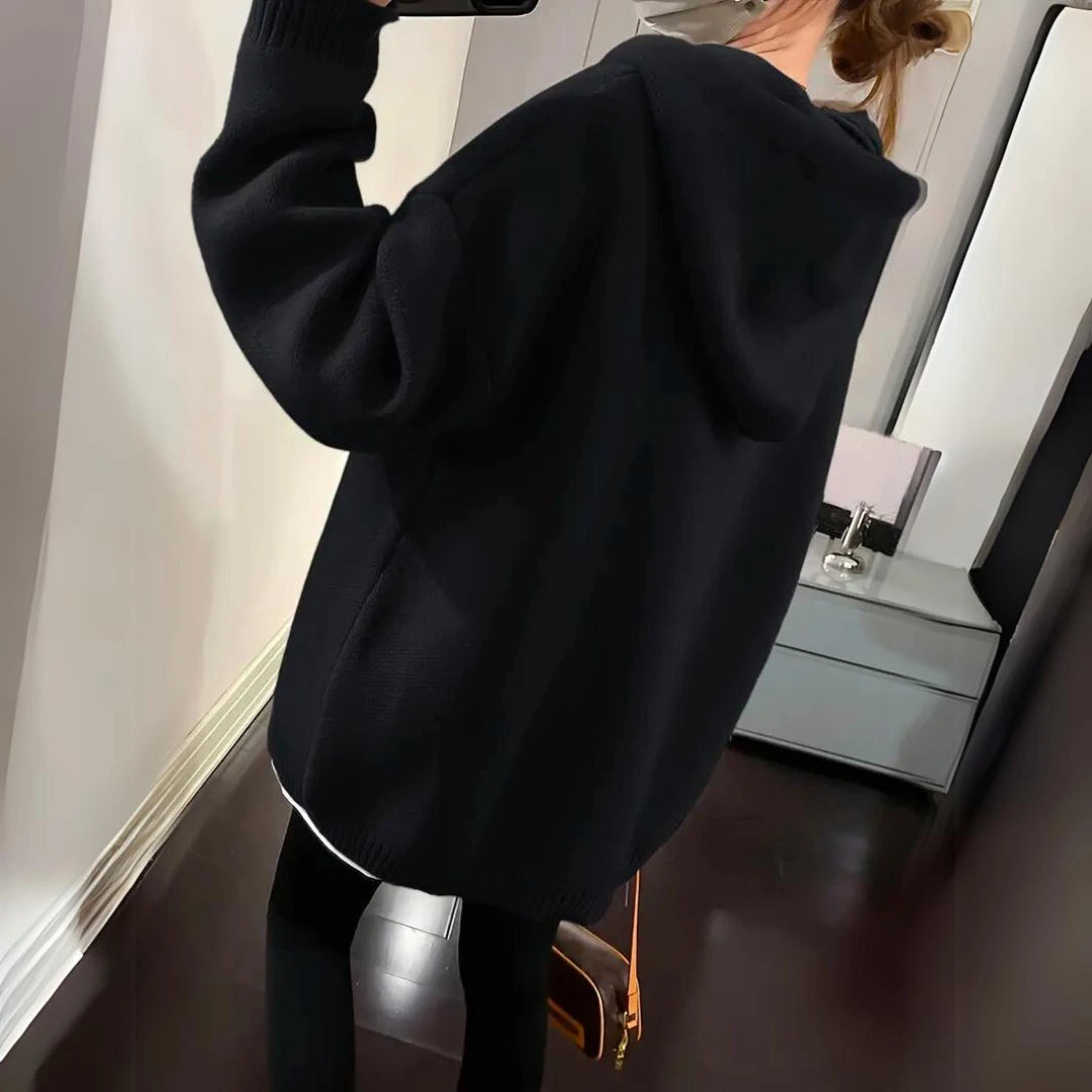 Black oversized knit hoodie, back view