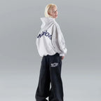 Driftly grey oversized love print pullover hoodie on model, back