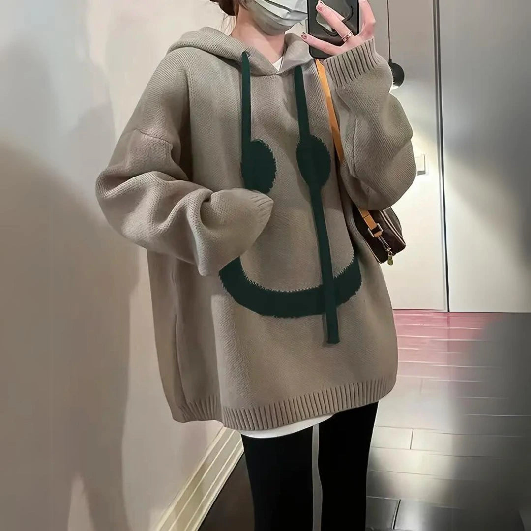 Khaki oversized knit hoodie with smiley print, side view