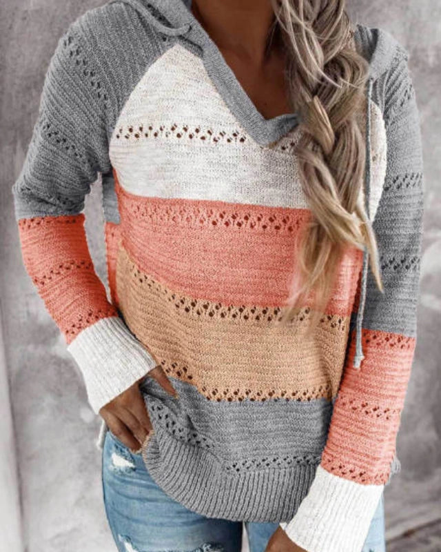 Orange striped colour-block knit hoodie on model