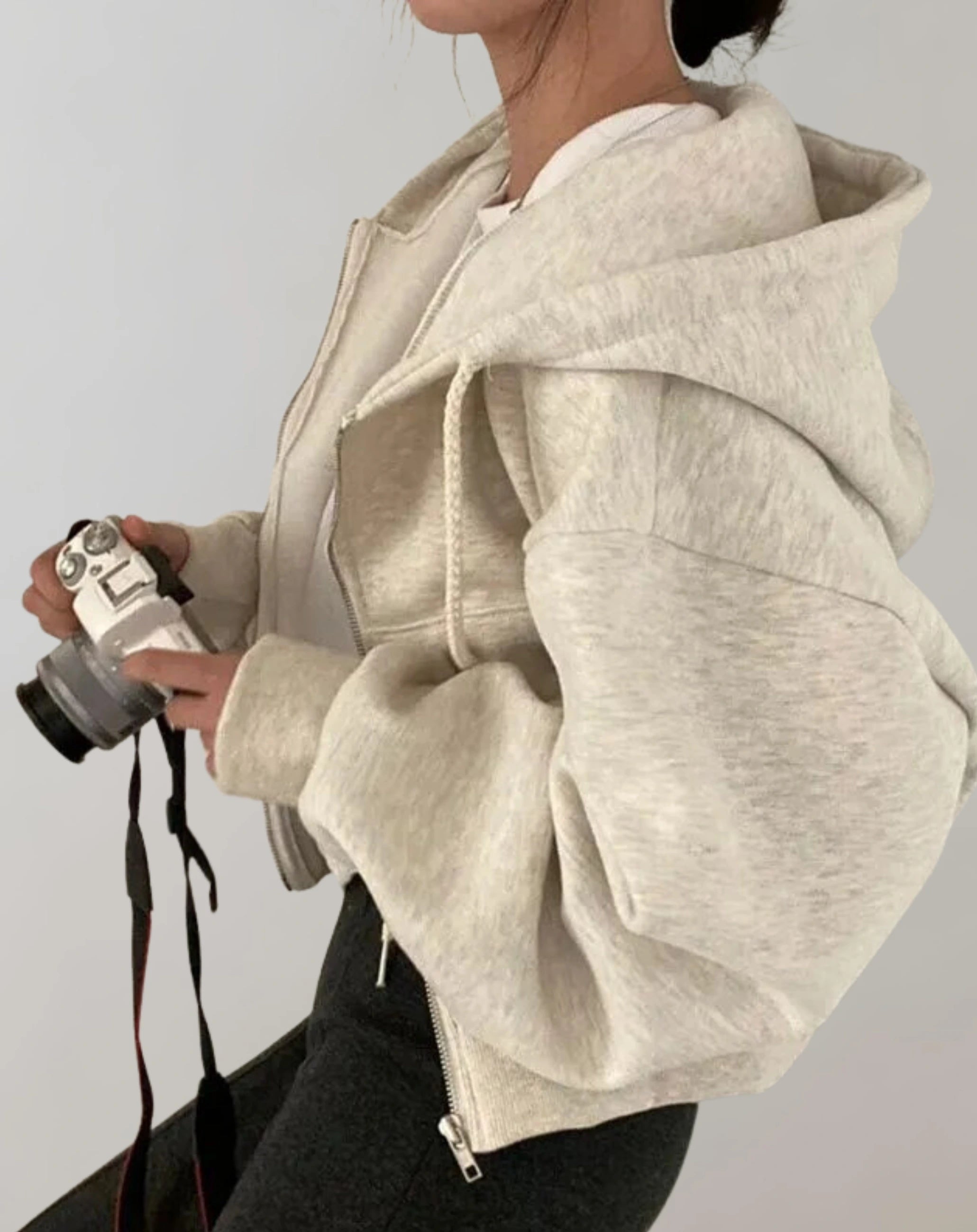 Driftly zip-up hoodie in beige, worn by model