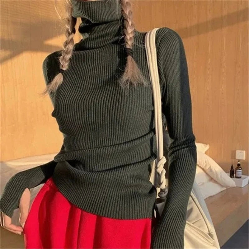 Woman wearing black ribbed turtleneck slim fit jumper