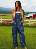 Woman wearing a printed tie-waist jumpsuit in a farm setting