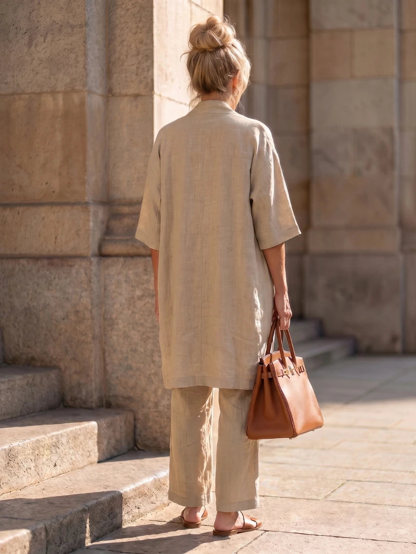 Woman wearing a beige relaxed three-piece set - editorial style photo