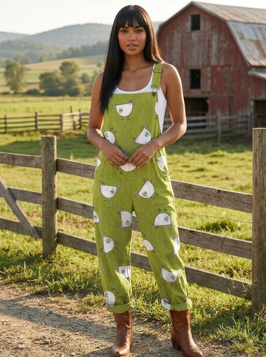 Woman wearing a green chick-print short-sleeve jumpsuit, different pose on a rural farm
