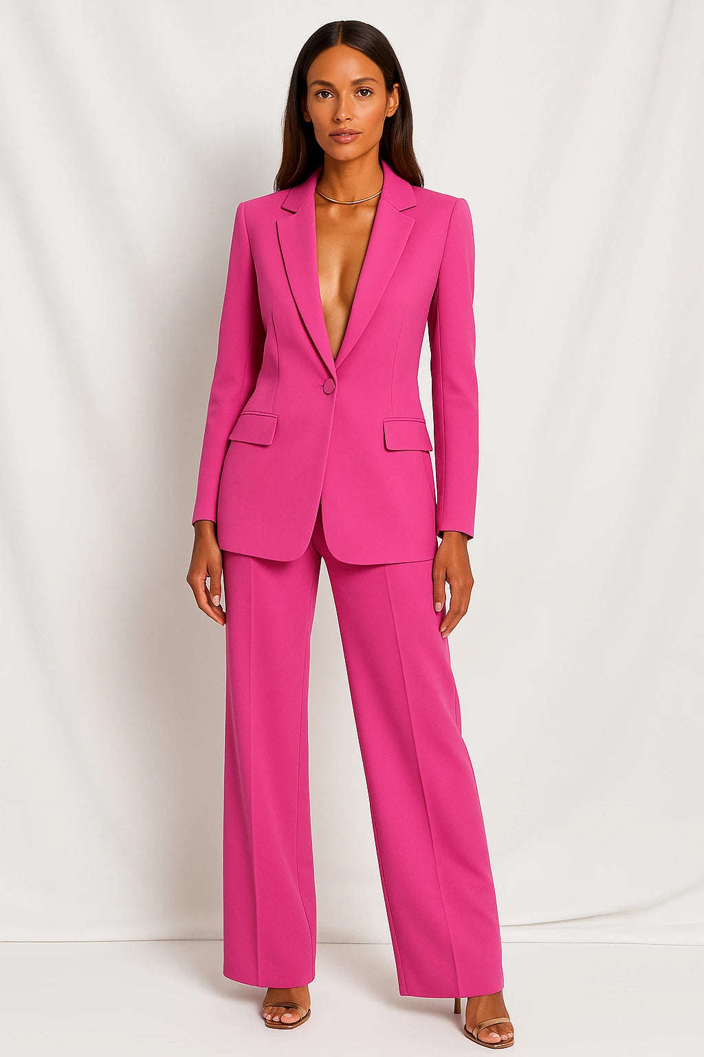 Woman wearing a hot pink stretch crepe two-piece jumpsuit - studio photo