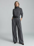Grey elegant casual jumpsuit with relaxed fit, turtleneck, wide-leg trousers, and matching black belt, studio front view.