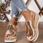 Woman wearing a gold wedge heeled platform orthopedic sandal - lifestyle photo
