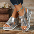 Woman wearing a silver wedge heeled platform orthopedic sandal - lifestyle photo