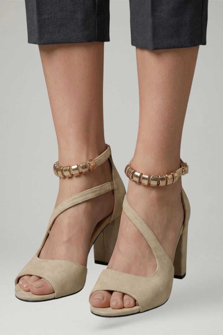 Woman wearing beige block heel adjustable strap sandals - lifestyle photo