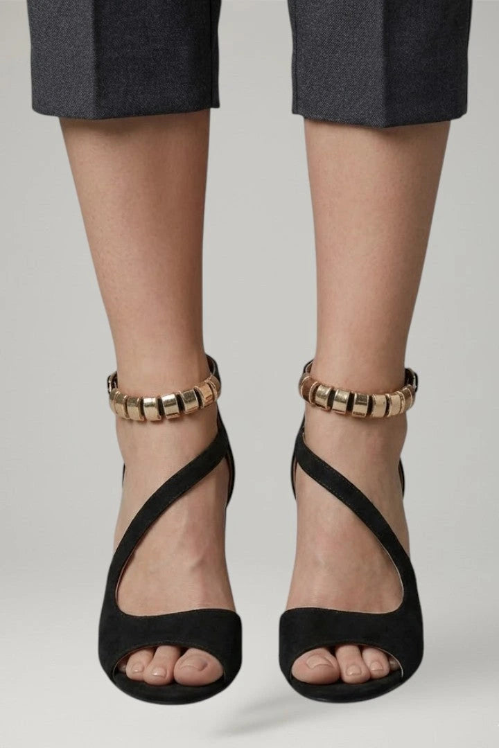 Woman wearing black block heel adjustable strap sandals - lifestyle photo
