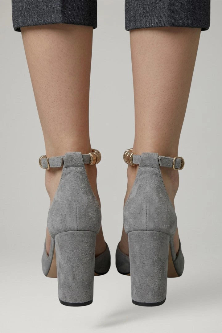 Woman wearing black block heel adjustable strap sandals - lifestyle photo