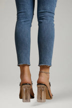 Woman wearing champagne gold block heel cushioned sandals - lifestyle photo