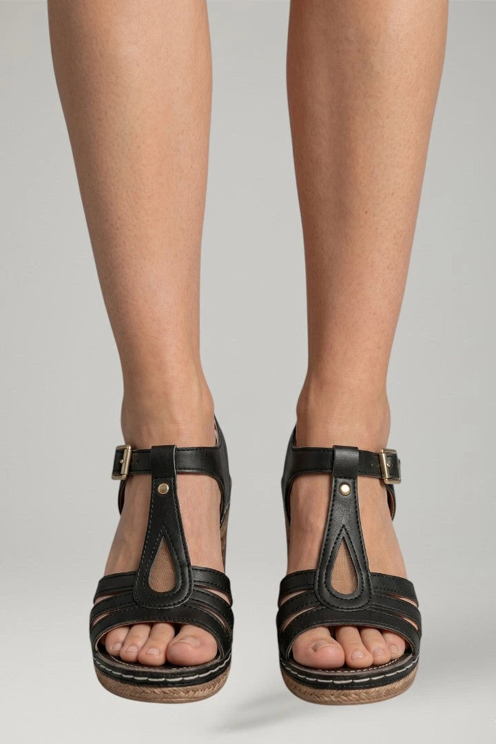 Woman wearing black block heel cushioned open-toe sandals - lifestyle photo