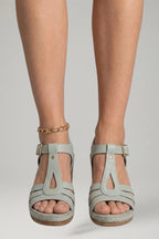 Woman wearing light grey block heel cushioned open-toe sandals - lifestyle photo