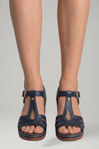 Woman wearing navy blue block heel cushioned open-toe sandals - lifestyle photo