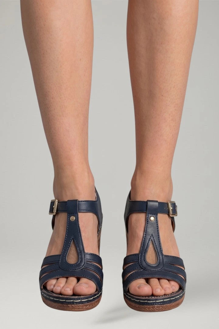 Woman wearing navy blue block heel cushioned open-toe sandals - lifestyle photo