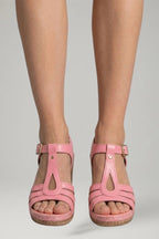 Woman wearing pink block heel cushioned open-toe sandals - lifestyle photo