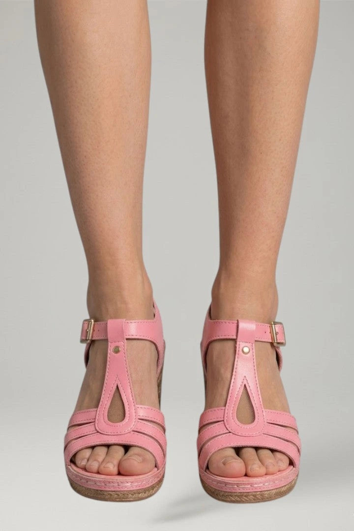 Woman wearing pink block heel cushioned open-toe sandals - lifestyle photo