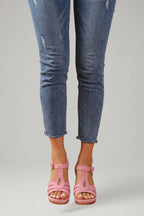 Woman wearing pink block heel cushioned strap sandals - lifestyle photo