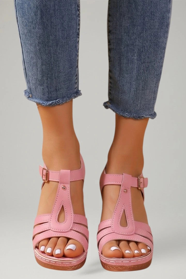 Woman wearing pink block heel cushioned strap sandals - lifestyle photo
