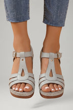 Woman wearing white block heel cushioned strap sandals - lifestyle photo