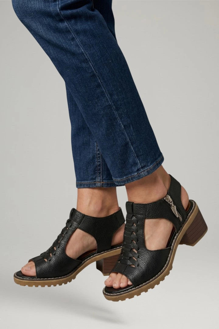 Woman wearing brown block heel zip closure sandals - lifestyle photo