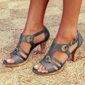 Woman wearing a gray cork heeled open-toe sandals - lifestyle photo