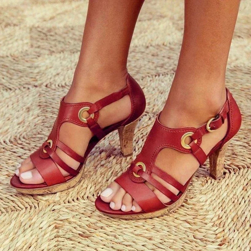 Woman wearing a red cork heeled open-toe sandals - lifestyle photo