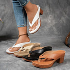 Woman wearing a brown heeled thong orthopedic sandals - lifestyle photo