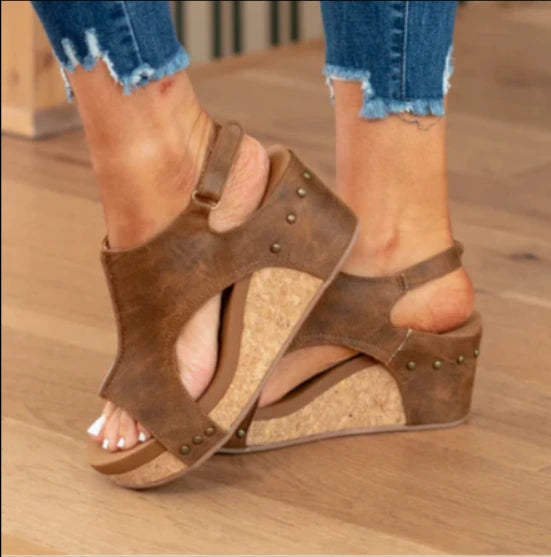 Woman wearing brown wedge slingback sandals - lifestyle photo