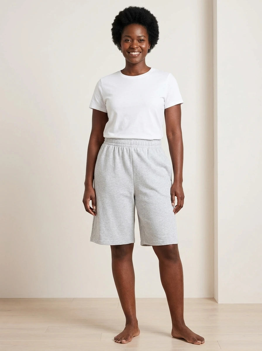 Gray lightweight casual summer shorts with elastic waistband and relaxed fit, studio front view.