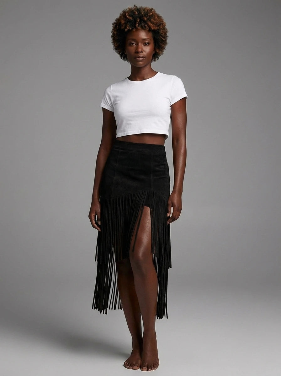 Woman wearing a black suede fringe ruffle split midi skirt in a studio setting