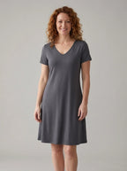Driftly women's gray V-neck A-line sundress, in a minimalist studio setting.