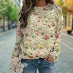 Driftly beige floral embroidered cotton crew neck sweater on model, street
