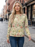 Driftly beige floral embroidered cotton crew neck sweater on model, city street