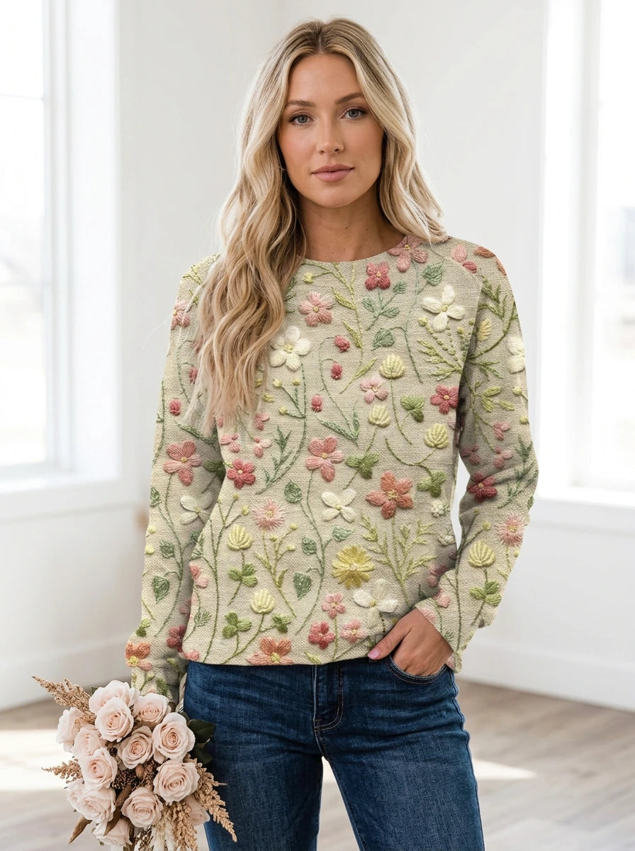 Driftly beige floral embroidered cotton crew neck sweater on model, studio front view