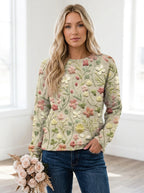 Driftly beige floral embroidered cotton crew neck sweater on model, studio front view