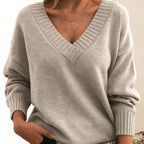 Beige cashmere V-neck balloon sleeve sweater on model