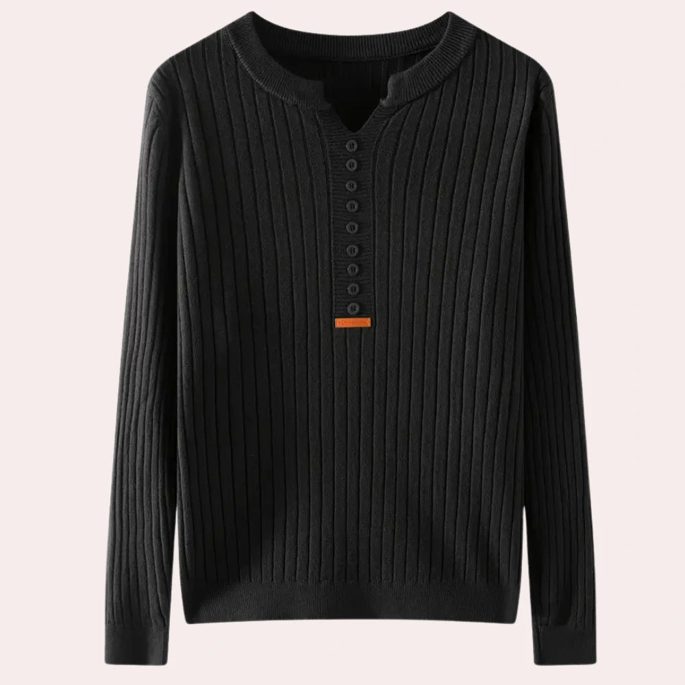 Black ribbed knit sweater with notched neck and button placket, flat lay