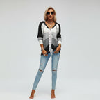 Black hooded lace-up sweater with openwork panels, front view