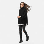 Black mock-neck sweater worn by model