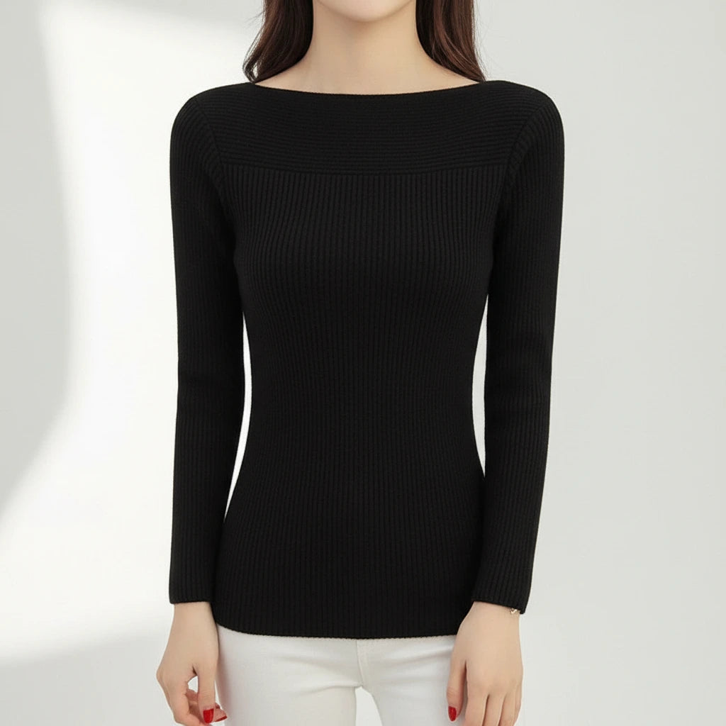 Woman wearing black ribbed boat neck sweater, studio photo