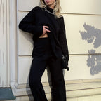 Driftly turtleneck sweater in black with relaxed fit and side split