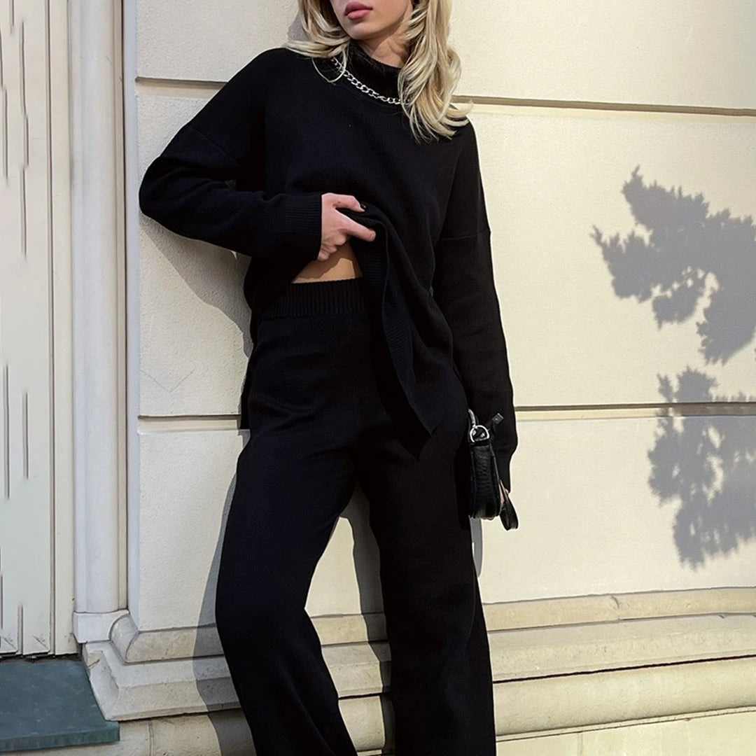 Driftly turtleneck sweater in black with relaxed fit and side split