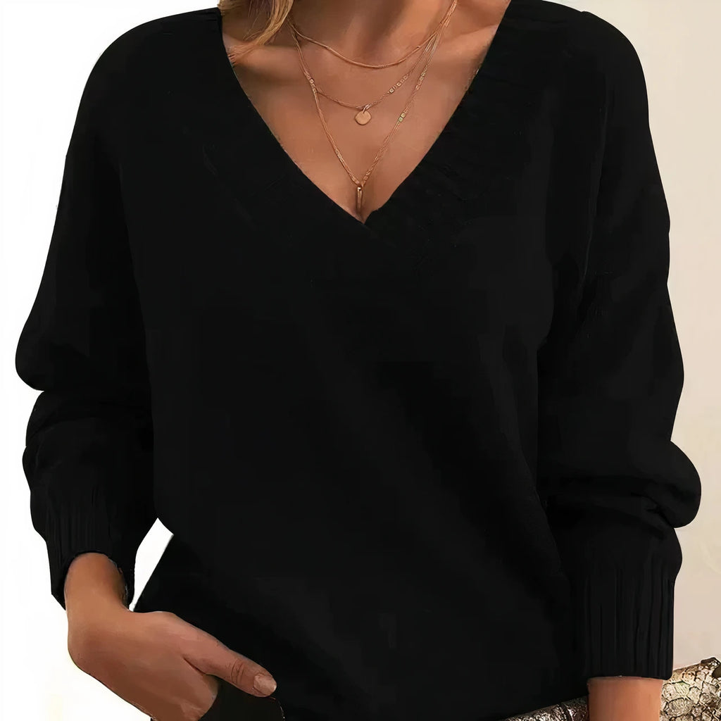 Black cashmere V-neck balloon sleeve sweater on model