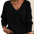 Black cashmere V-neck balloon sleeve sweater on model