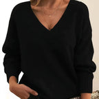 Black cashmere V-neck balloon sleeve sweater on model
