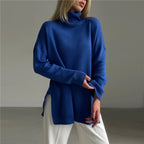 Driftly turtleneck sweater in blue with relaxed fit and side split